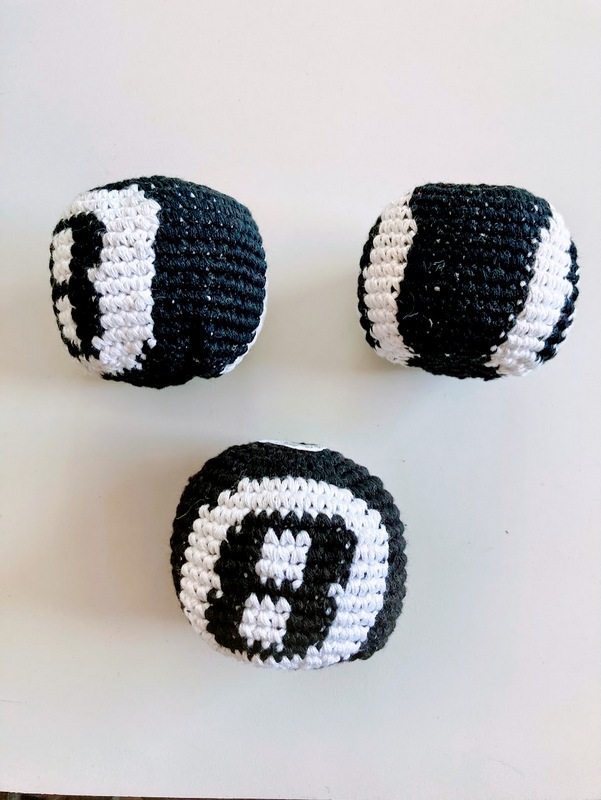 Classic novelty 8 ball pattern hand-crocheted cotton footbag featuring premium pellet fill structure.