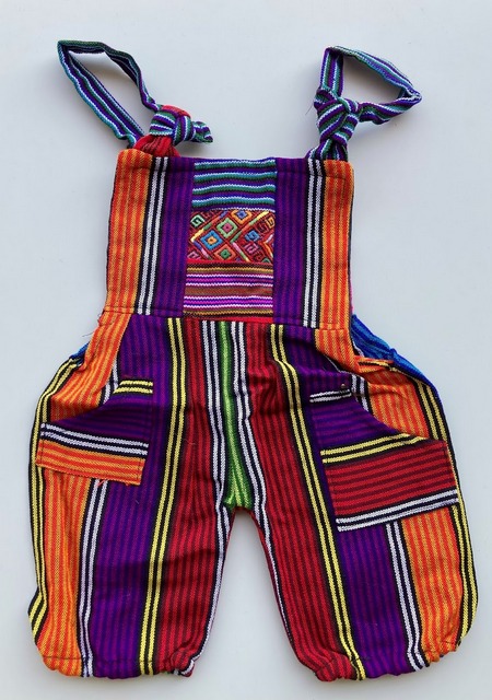 Hand-loomed cotton baby romper with traditional patterns
