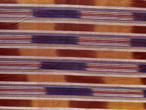 Tan multicolor hand-loomed Ikat cloth from Guatemala
