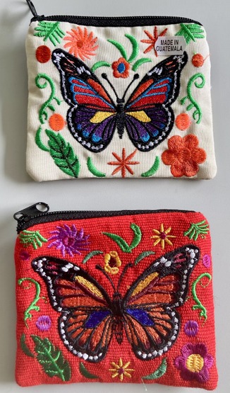 Beautiful multicolored butterfly design hand-embroidered on a durable zippered suede leather coin purse.